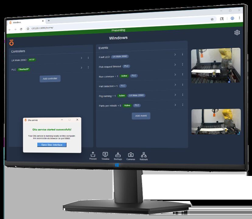 Industrial panel PC with Olis diagnostic software interface displaying automation system status